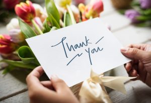 Bouquet of tulips and thank you card